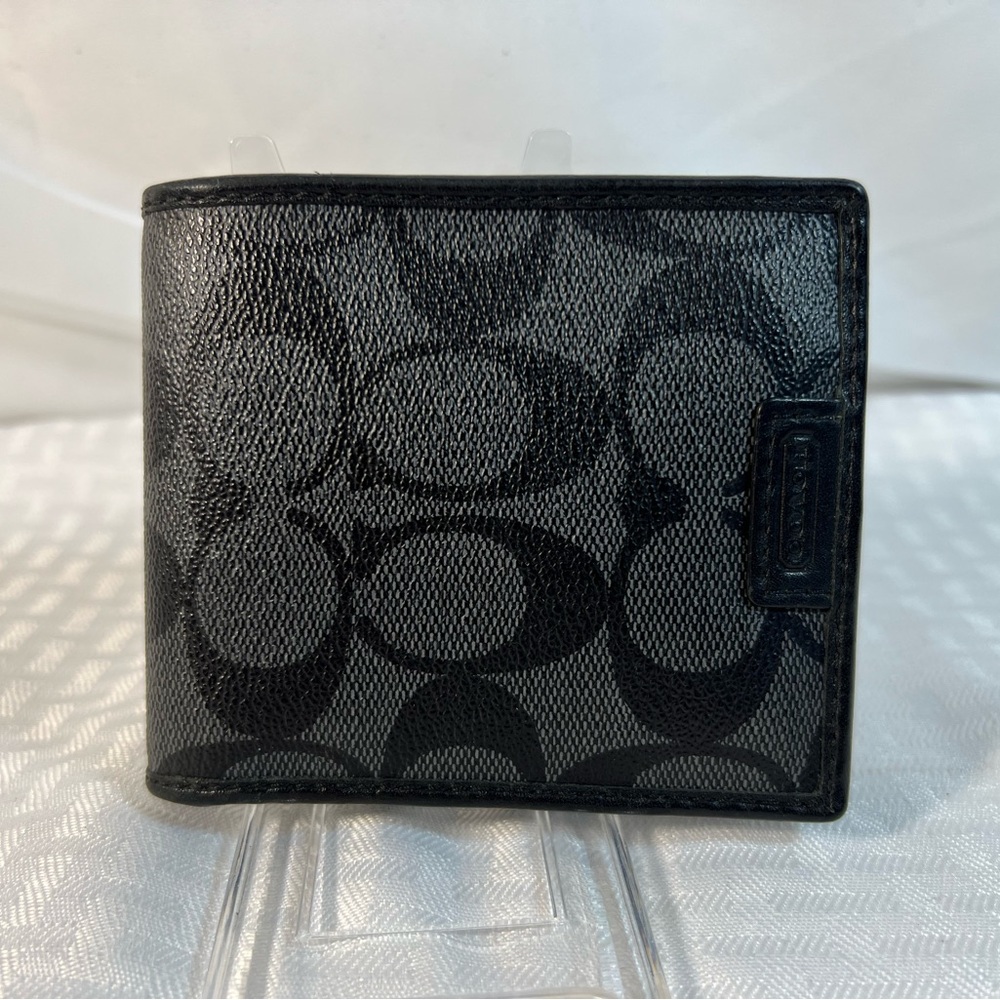 2065: Coach Men’s Black Signature Canvas Bifold Wallet Leather Trim